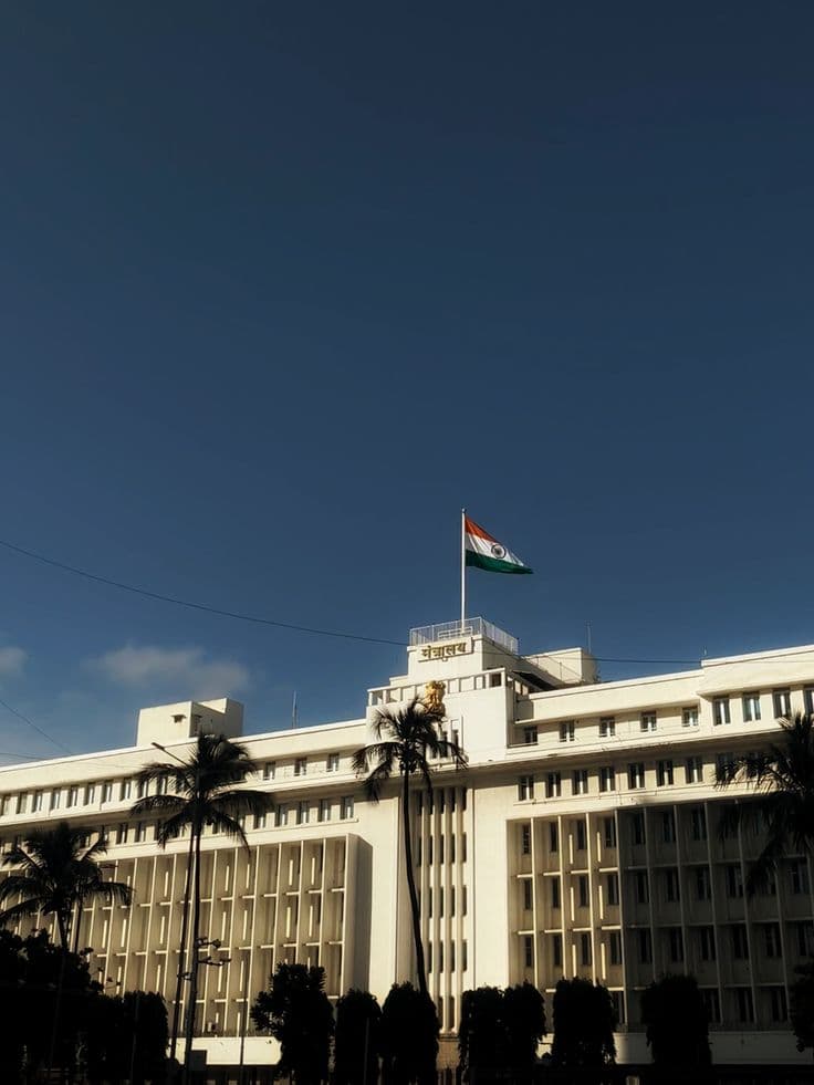 Indian public institution building with the national flag